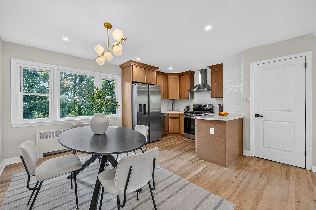 Finished kitchen and dining area at Pilla’s 340 Northwood Way project in Palisades Park, New Jersey